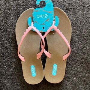 Oka b flip flops size 7.